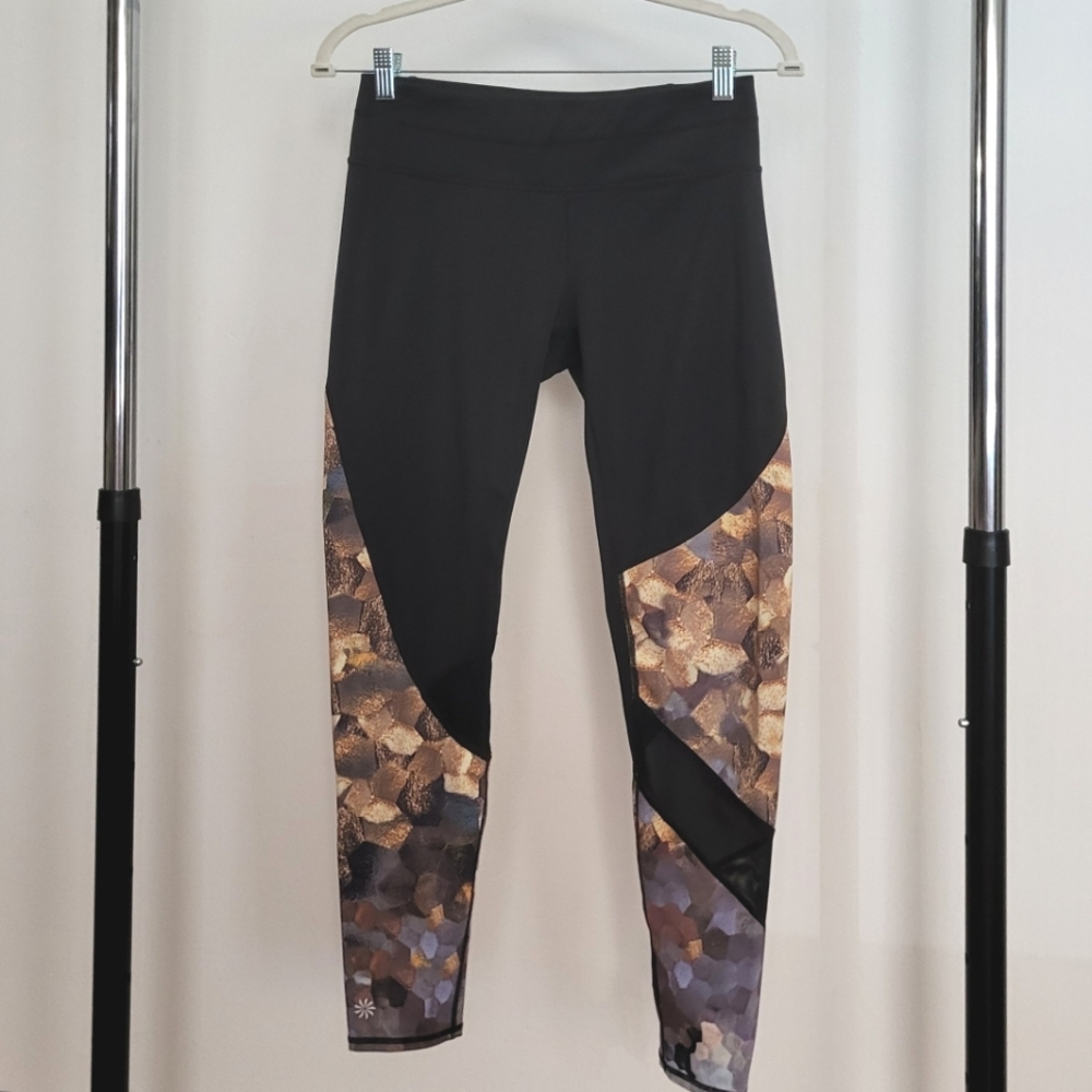 Athleta Black and Gold Asymmetrical Leggings Size S